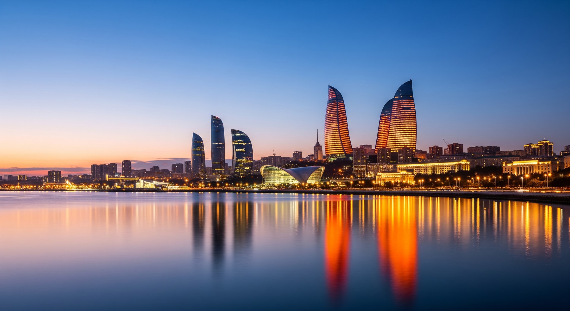Modern Baku skyline with Flame Towers and Caspian Sea at night