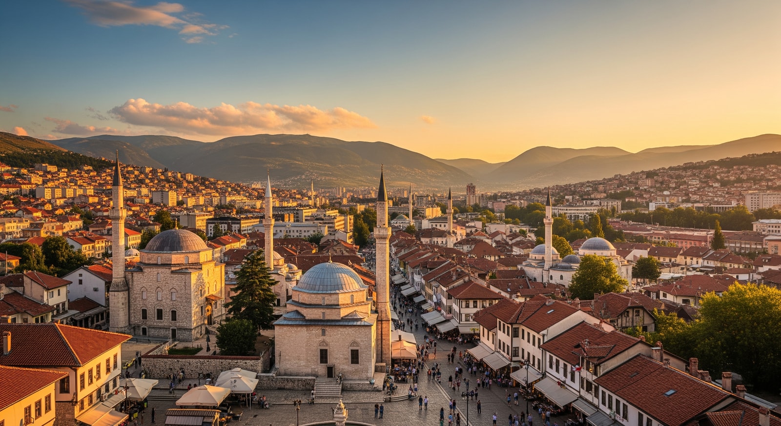 Panoramic view of Sarajevo with historic Bascarsija bazaar district and surrounding mountains at golden hour