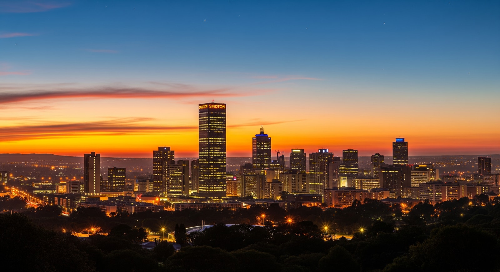 Modern Johannesburg skyline with Sandton City towers at dusk showing the economic hub of South Africa